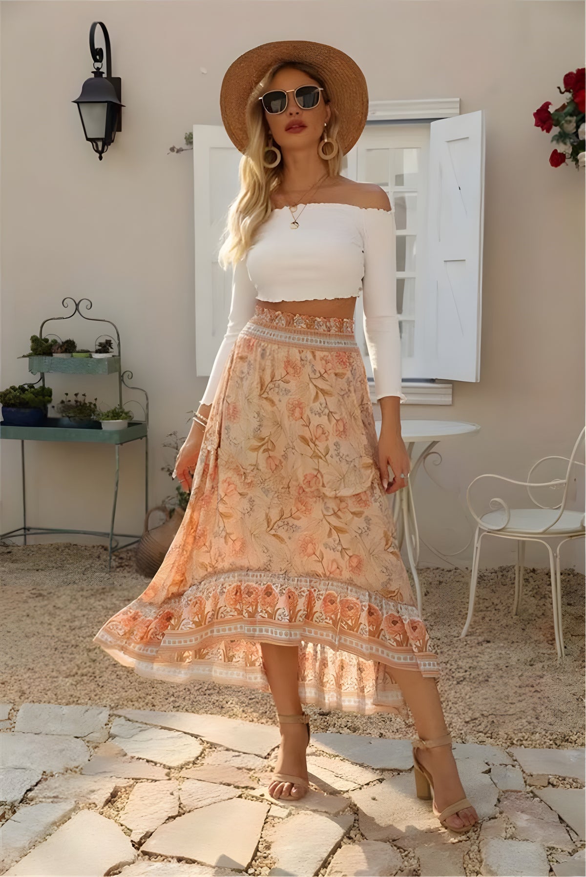 Jupe midi hippie pêche fleurie, ourlet asymétrique et bordure ethnique