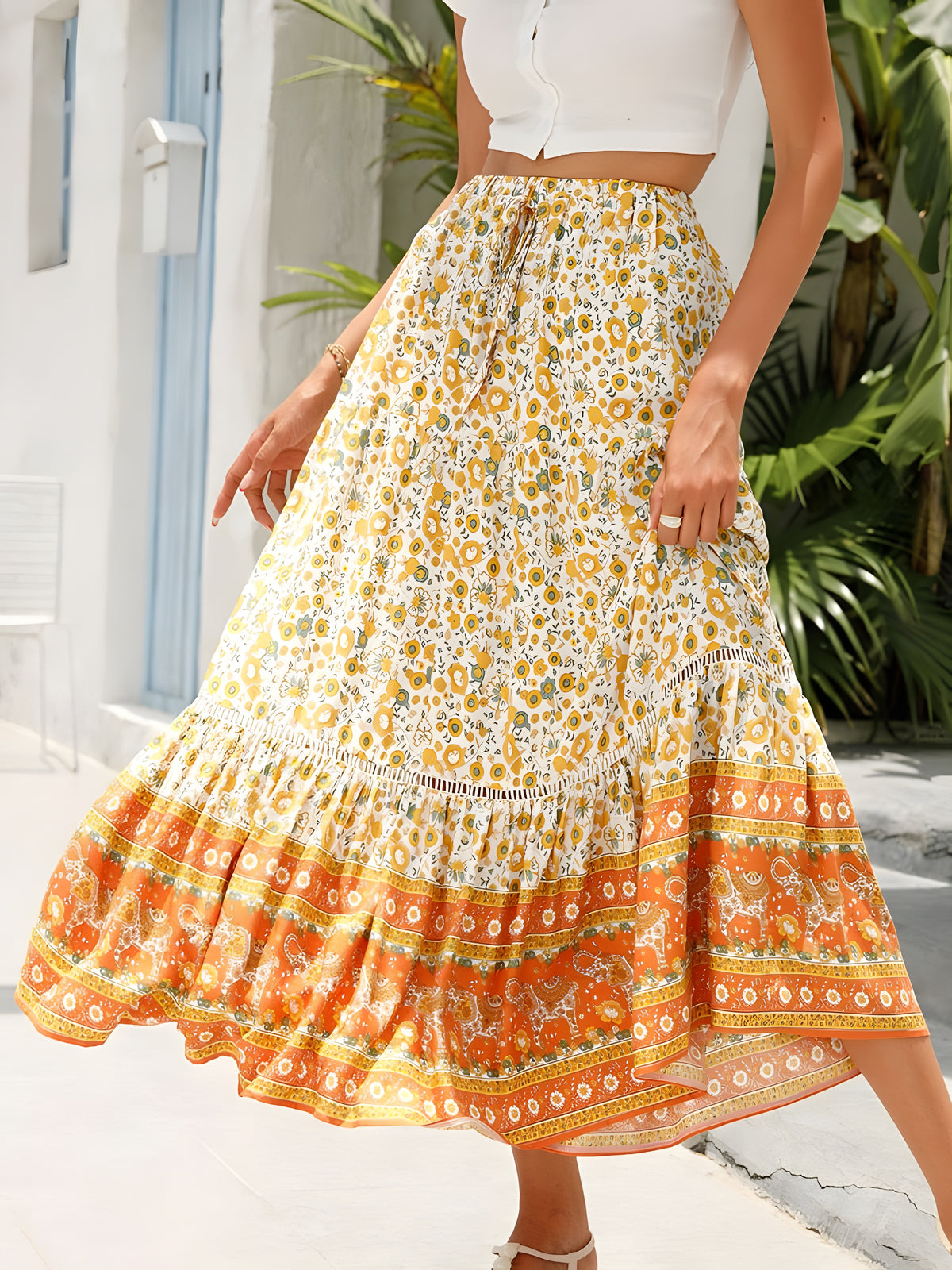 Jupe longue hippie crème fleurs jaunes, bordure ethnique orange et volants