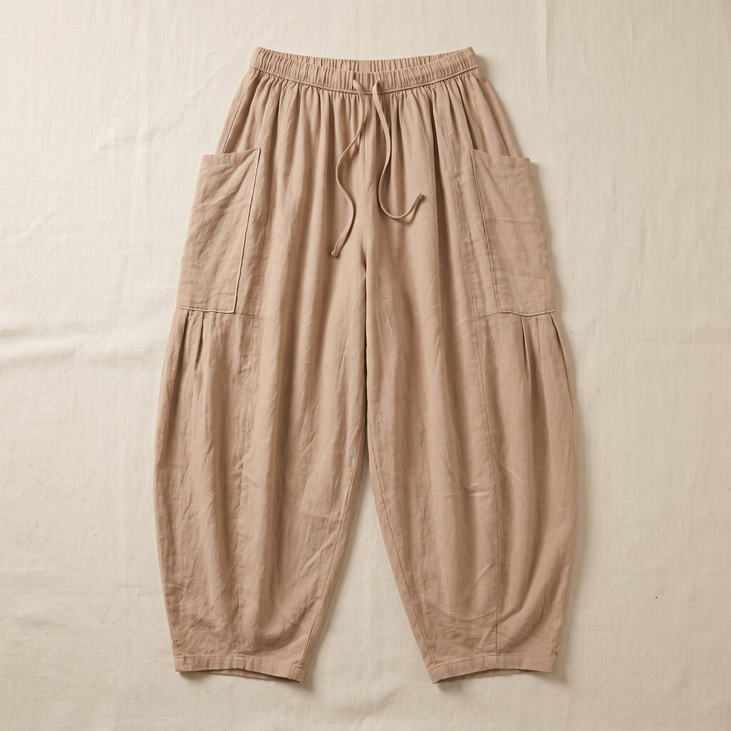 Pantalon sarouel beige packshot, coupe ample et poches