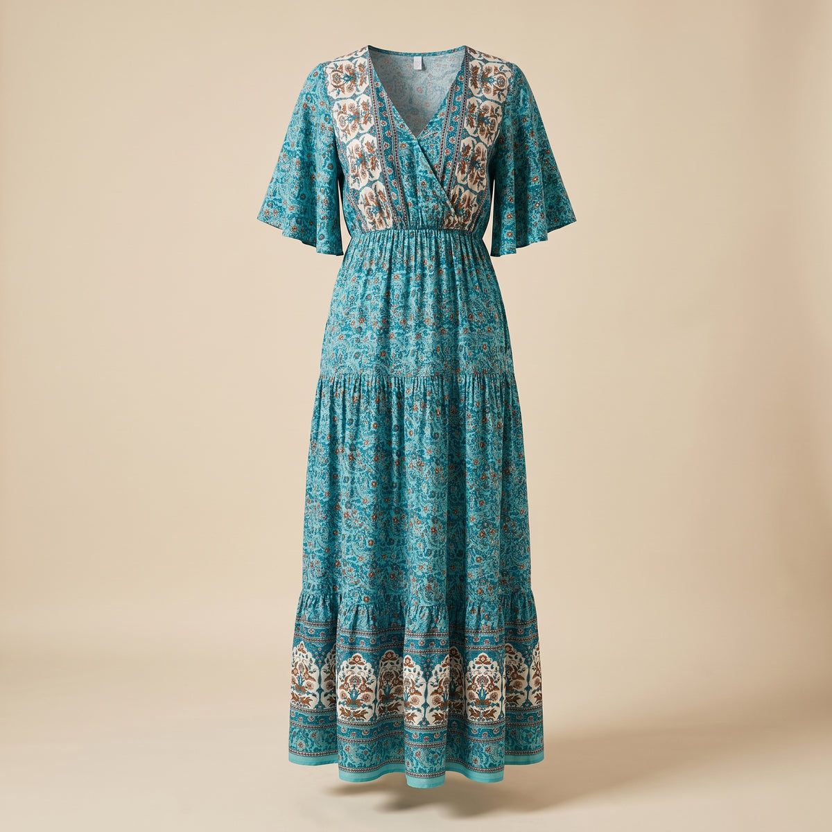 Robe longue bohème turquoise à fleurs, vue studio sur mannequin invisible
