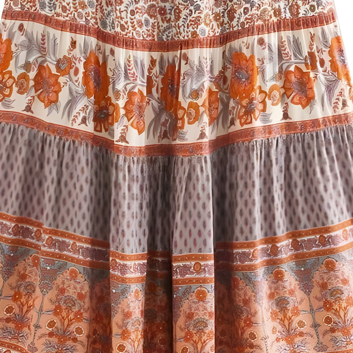Gros plan imprimé floral vintage terracotta et bordure ethnique