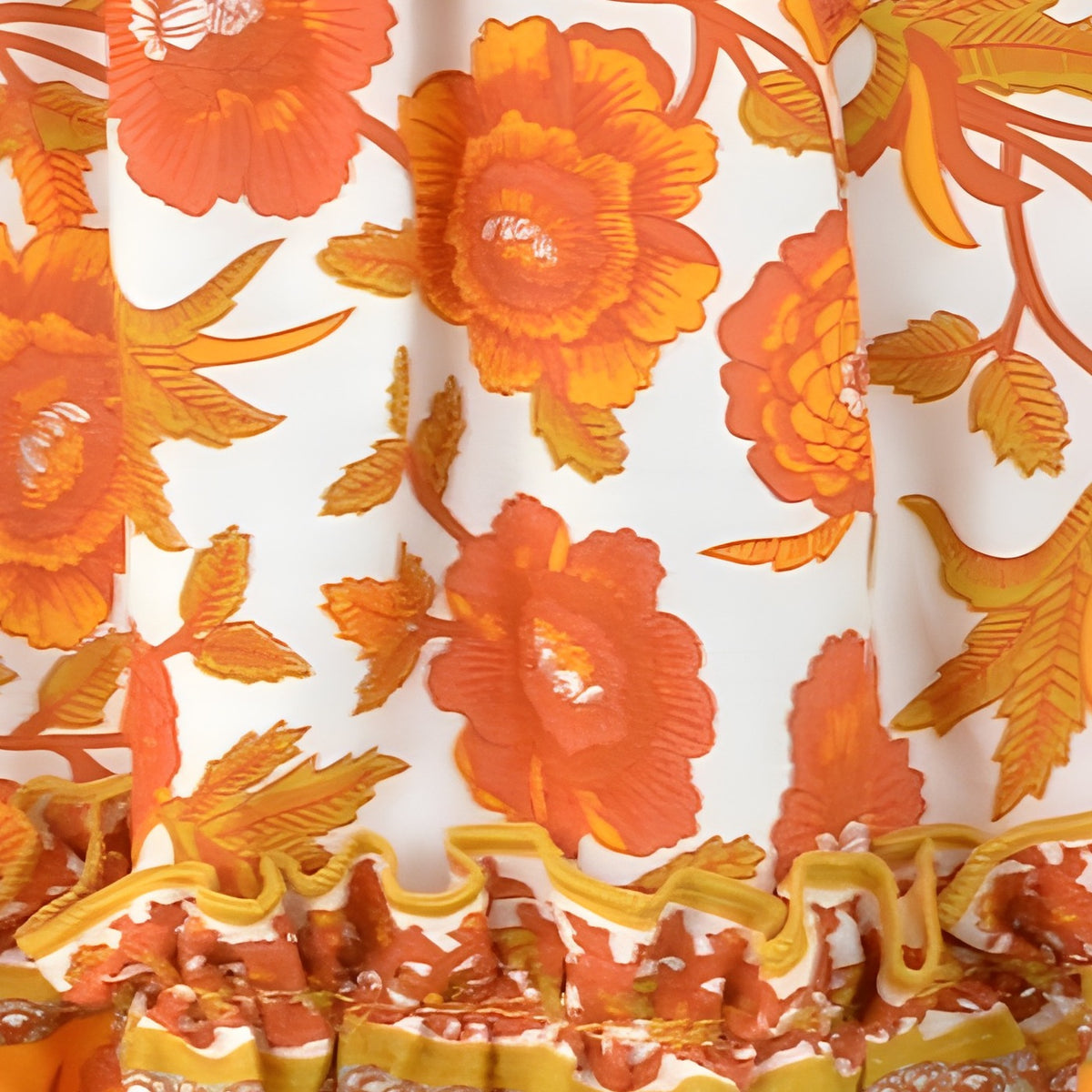 Gros plan imprimé floral orange et bordure ethnique block-print