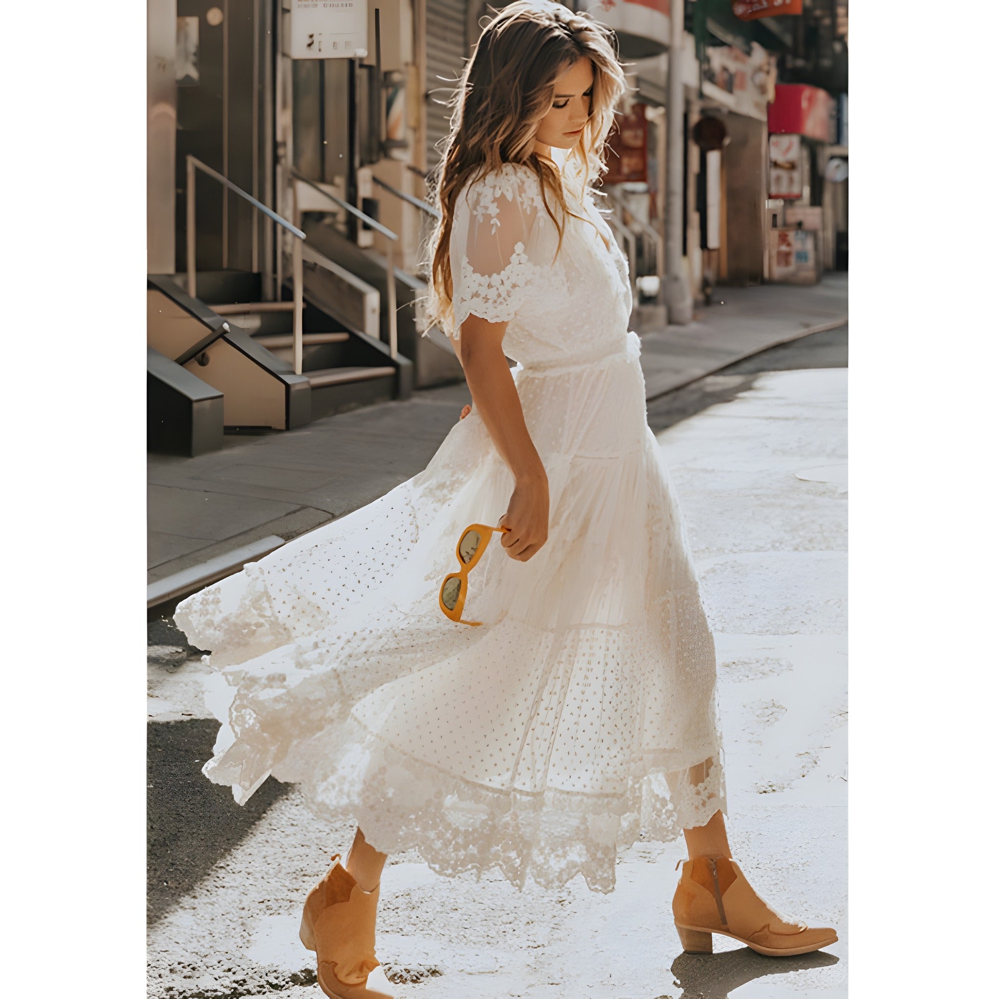 Robe longue blanche dentelle bohème portée en ville, allure festival Bild