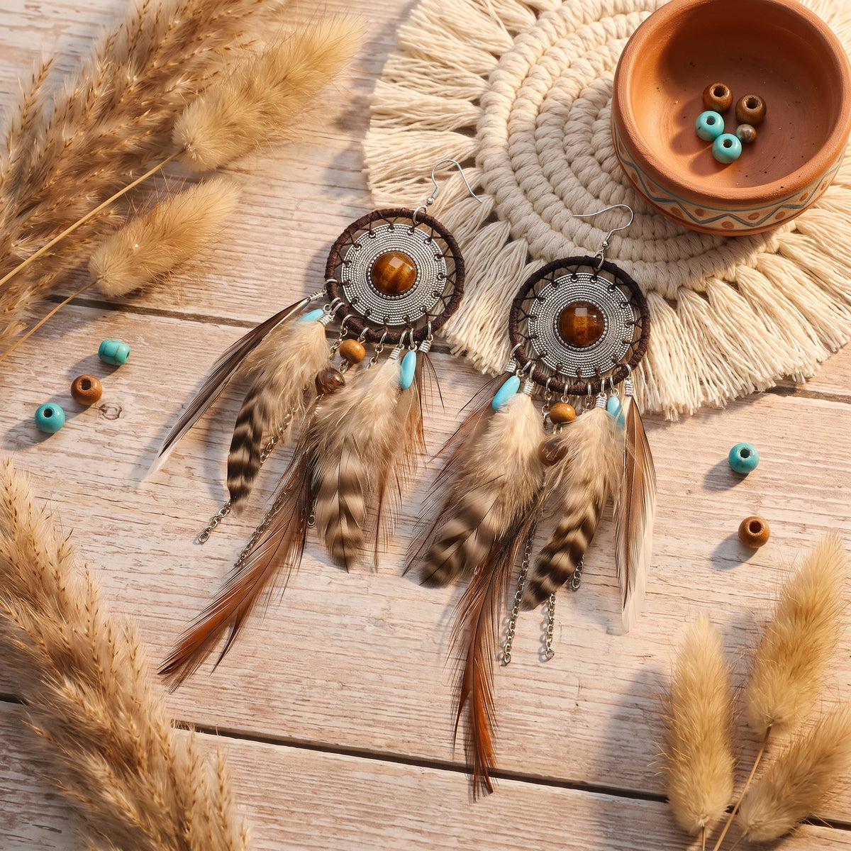 Boucles d'oreilles attrape-reves plumes en decor boheme