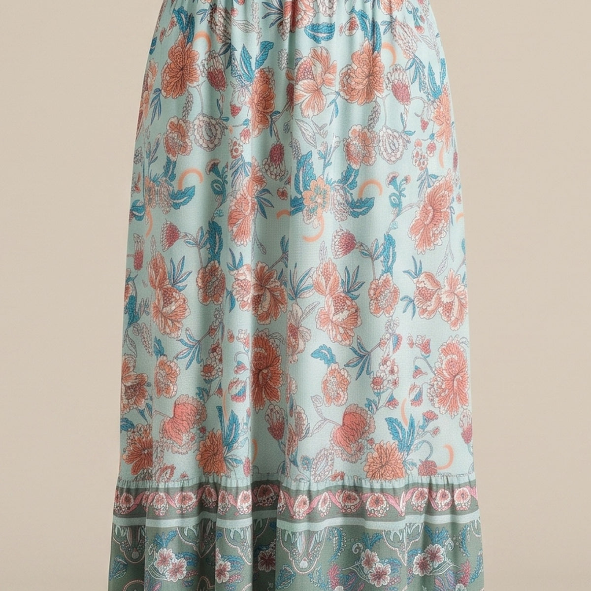 Détail de l'imprimé floral bohème menthe et corail