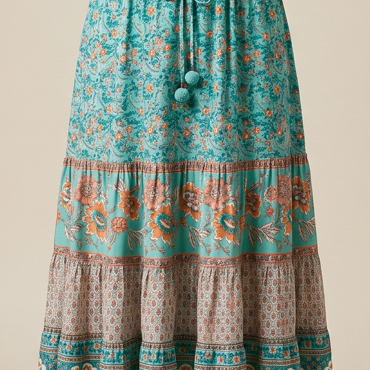 Détail de l'imprimé floral turquoise et de la bordure