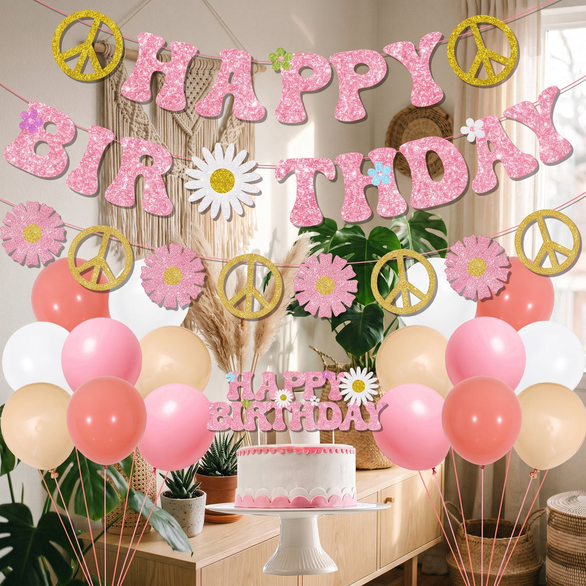 Kit de décoration d’anniversaire hippie installé dans un salon bohème, guirlandes HAPPY BIRTHDAY roses pailletées et ballons pastel