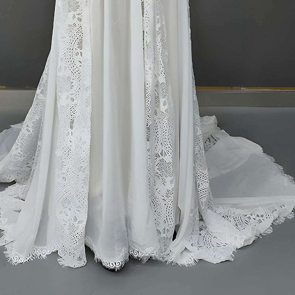 Détail des panneaux ajourés, de l’ourlet et de la traîne de la robe de mariée bohème